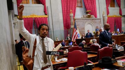 Justin Jones carries his name tag after he was expelled from the Tennessee House of Representatives for his role in a gun control demonstration. Reuters