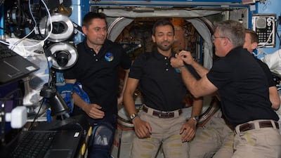 Sultan Al Neyadi receives the golden astronaut pin from his crewmates. Photo: Sultan Al Neyadi / Twitter