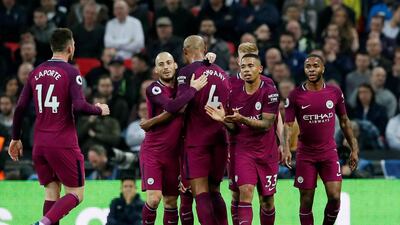 Manchester City's Gabriel Jesus celebrates with teammates scoring their first goal. David Klein / Reuters