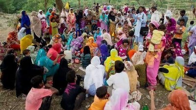 Pakistani Christians from a neighbourhood where a girl was arrested on blasphemy charges pray in a clearing of an urban forest in Islamabad on Monday.