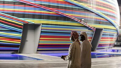 Visitors walk past the Russia Pavilion at Dubai Expo. Khushnum Bhandari/ The National