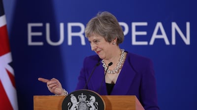 Theresa May speaks to the media following the EU summit. Getty Images