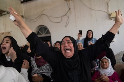 Palestinian mourners at the funeral of teenager Mohammad Balhan in the West Bank refugee camp of Aqabat Jaber. AP