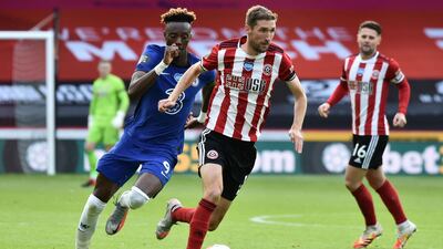Chris Basham - 8: Blades were so well drilled at the back with Basham playing his part. AFP