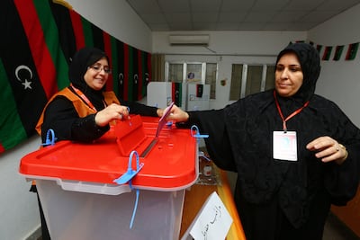 A woman casts her vote in Tripoli in 2014, in the last national election held in Libya. AFP