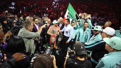 Canelo Alvarez celebrates after his victory over Jaime Munguia. AFP
