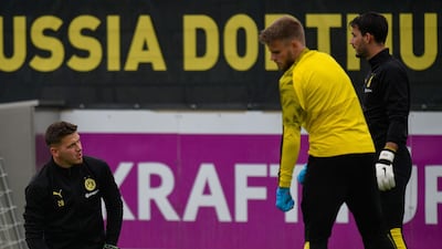 Dortmund's goalkeepers take part in a training session on the eve of the UEFA Champions League Group F football match between Borussia Dortmund and Barcelona in Dortmund, western Germany, on September 16, 2019. / AFP / SASCHA SCHUERMANN