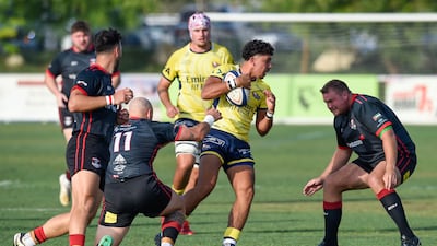 Action from the the UAE Premiership final between Dubai Exiles (black) v Dubai Hurricanes (yellow) held at The Sevens in Dubai