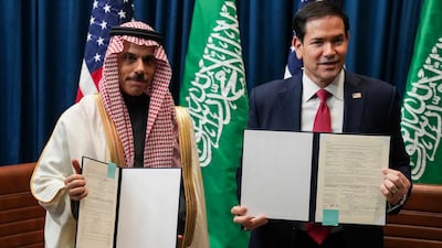 US Secretary of State Marco Rubio and Saudi Arabia's Foreign Minister Prince Faisal bin Farhan show signed documents for Expo 2030 Riyadh. AFP