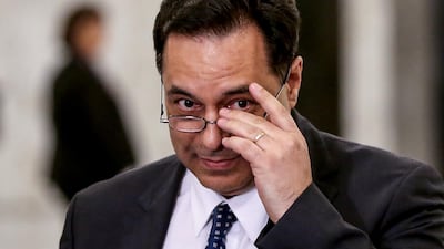 Newly assigned Lebanese Prime Minister Hassan Diab speaks to media after his meeting with Lebanese President Michel Aoun and Lebanese Parliament Speaker Nabih Berri at the presidential palace in Baabda. EPA