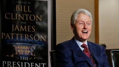 Former president Bill Clinton promoting 'The President is Missing'. Bebeto Matthews / AP