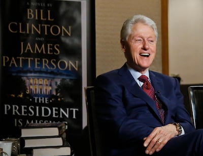 Former president Bill Clinton promoting 'The President is Missing'. Bebeto Matthews / AP