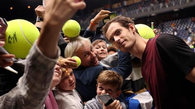 Andy Murray poses with fans after beating Stan Wawrinka to win the European Open final on Sunday, October 20. It was the Scot's first tour title since undergoing career-saving hip surgery. AP