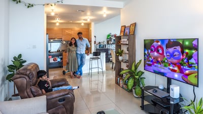 The apartment has a living room and separate dining area