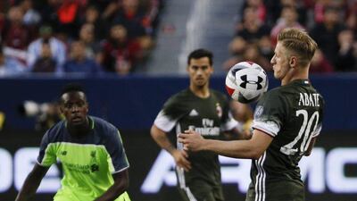 AC Milan’s Ignazio Abate (R) traps the ball as Liverpool forward Divock Origi (L) looks on during the second half of the International Champions Cup match between Liverpool and AC Milan at Levi’s Stadium in Santa Clara, California, USA, 30 July 2016. John G Mabanglo / EPA
