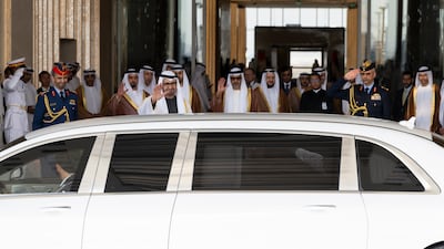 Sheikh Mohamed waves Mr Modi's car off as his official guest is driven away. Mohamed Al Hammadi / Presidential Court