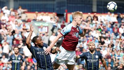 Manchester City's Raheem Sterling in action with Burnley's Ben Mee. Reuters