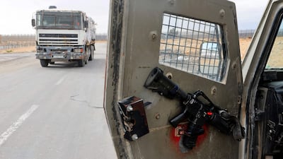A Palestinian lorry arrives to pick up aid from a drop-off area near the Karam Abu Salem crossing on November 28. AFP