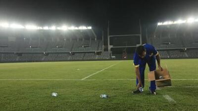 Mohammed Noursal cleans the ground at Zayed Sports City after every match.