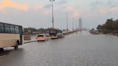 Drivers on a flooded road in Ras Al Khaimah on Saturday. Photo: Storm Centre