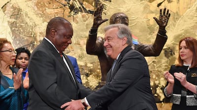 South Africa President Cyril Ramaphosa, left, and United Nations Secretary General Antonio Guterres shake hands after the unveiling ceremony of the Nelson Mandela Statue. AP