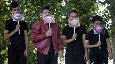 Young Syrian refugees from 'The Caravan' theatre project perform at an unofficial refugee camp in the Lebanese village of Bar Elias on June 22, 2016. Joseph Eid/AFP