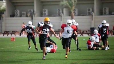 The UAE Falcons, in black, have been recognised as the UAE's national American football team.