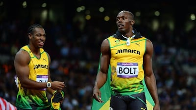 Usain Bolt, right, is yet to break 10secs in the 100m this year. Olivier Morin / AFP