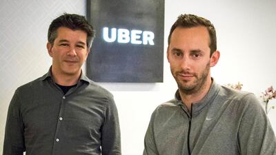 Former Uber CEO Travis Kalanick, left, and Anthony Levandowski, co-founder of Otto. Uber has settled a lawsuit alleging that it ripped off self-driving car technology from Google's autonomous vehicle division Waymo. Tony Avelar/AP
