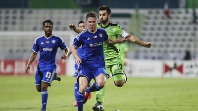 Al Nasr's Renan Garcia, centre, fends off Carlos Villanueva of Al Shabab during their GCC Clubs Cup semi-final second leg at Maktoum Bin Rashid Al Maktoum Stadium in Dubai on May 19, 2015. Sarah Dea / The National