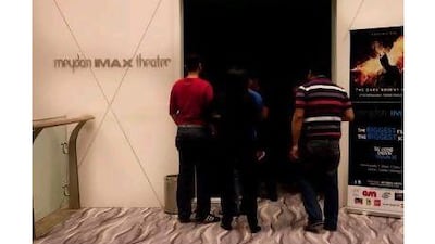 A reader wonders how many people saw The Dark Knight Rises outside of the UAE. Razan Alzayani / The National