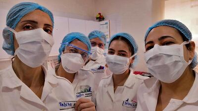 A picture taken by a nurse at the Hotel Dieu de France Hospital, shows colleagues in the coronavirus section of the hospital, in the neighbourhood of Ashrafieh of the Lebanese capital Beirut's eastern suburbs. AFP