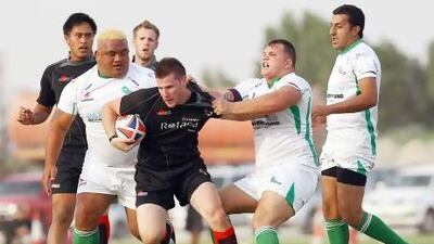 The UAE Falcons, in black, played against a Pakistan side in March last year at the Dubai Sports City. Satish Kumar / The National