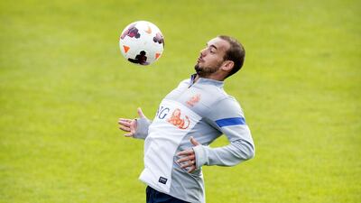 The commitment of Wesley Sneijder was questioned so much that the captaincy armband was taken away. Koen Van Weel / AFP