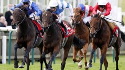 Ghanaati, left, falls behind to Sahpresa, ridden by Ted Durcan (No 4), in the Sun Chariot Stakes.
