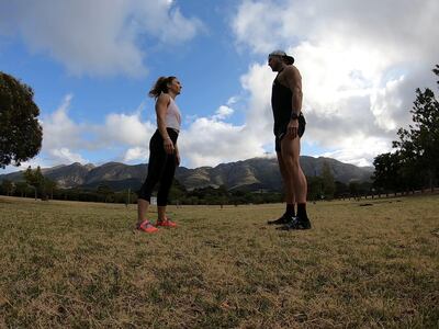 Take your starting position by facing your partner