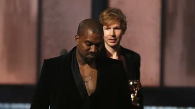 Beck watches Kanye West, who pretended to take the stage after Beck won Album of the Year for Morning Phase, at the 57th annual Grammy Awards in Los Angeles, California, on February 8. REUTERS / Lucy Nicholson