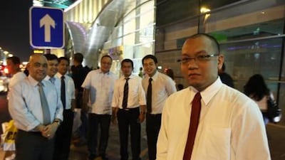 Gene Carl Tupas (right) a member of Plead, is joined by fellow members at Al Reef Mall in Deira. He said he wanted to teach Filipinos their rights and obligations.