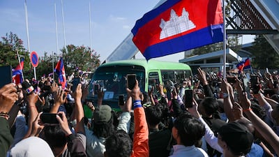 Cambodians gather in Phnom Penh to welcome soldiers released by Thailand, after the countries agreed to a fragile ceasefire in deadly border clashes. AFP