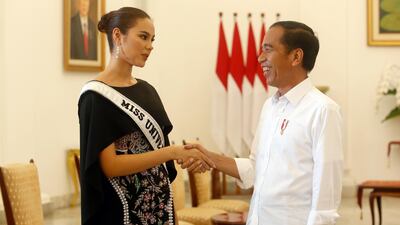 Indonesian President Joko Widodo greets Miss Universe 2018 Catriona Gray at The Presidential Palace in Bogor, Indonesia. EPA
