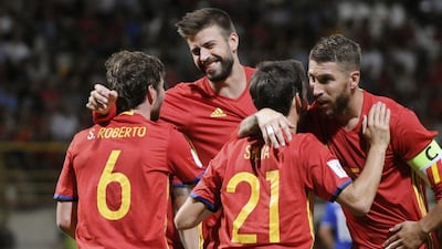 Gerard Pique and Sergio Ramos celebrate with Sergi Roberto and David Silva. J Casares / EPA