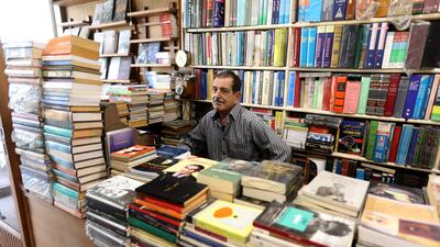 Owner Ali Hussein waits for customers at his bookshop named Al Nahda Al Arabiya Library, or Arab Renaissance Library, in central Baghdad. All photos: EPA