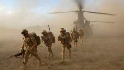 British soldiers at the start of a joint operation with the Afghan National Army in May to search compounds and destroy drug caches and narcotic manufacturing facilities.