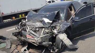 Three people were injured after an SUV crashed into a smaller car on Sheikh Mohamed bin Zayed Road. Courtesy: Dubai Police