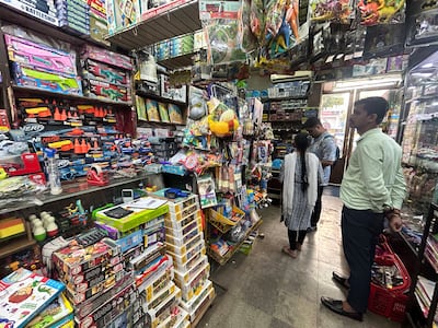Customers browse through the toys laid out in the small shop in Connaught Place, the commercial hub of New Delhi. Taniya Dutta / The National
