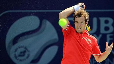 Richard Gasquet of France sends in a low forehand volley at the Aviation Club.