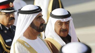 UAE Vice President and Prime Minister and Ruler of Dubai Sheikh Mohammed bin Rashid Al Maktoum is received by Bahraini prime minister Prince Khalifa bin Salman as he arrives for the GCC summit.