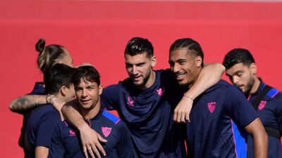 From left: Sevilla's Oliver Torres, Rafa Mir and Loic Bade during training. AFP