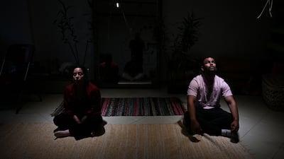 Meditating at a well-being centre in Cairo, where both Muslims and Christians are welcome, offering Sufi practices and modern transcendental techniques. EPA
