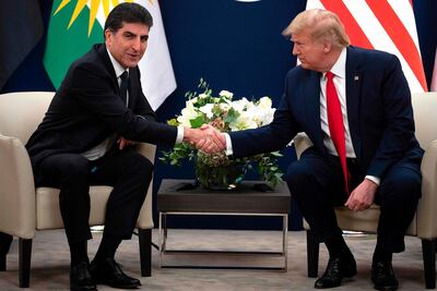 US President Donald Trump speaks with Kurdistan Regional Government President Nechirvan Barzani in Davos last month. AFP